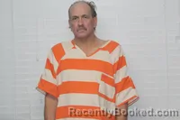 Mugshot of JOHN NELS JENSEN