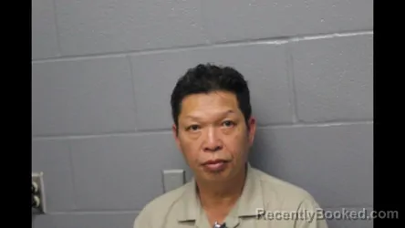 Mugshot of Dai Van Tran booked in Cooper County, Missouri on October 11, 2026