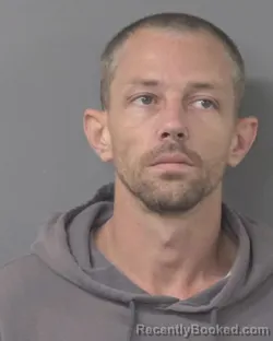 Mugshot of JUSTIN BLAKE SIMS