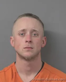 Mugshot of JUSTIN TYLER MOORE