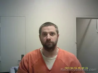 Mugshot of HOWARD E HUGHES