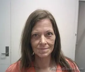 Mugshot of SUSAN ANN JORGENSEN booked in Daviess County, Missouri on May 13, 2026