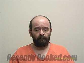 Booking photo from De Kalb County, Missouri