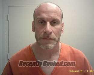 Booking photo from De Kalb County, Missouri