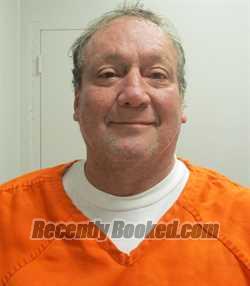 Booking photo from De Kalb County, Missouri