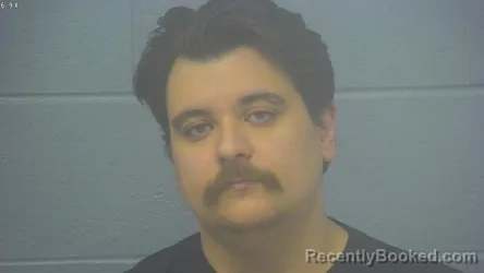 Mugshot of AARON MICHAEL SCHEKORRA booked in Greene County, Missouri on May 7, 2026