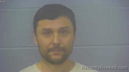 Mugshot of FIRUZ MAMADZHONOV booked in Greene County, Missouri on March 13, 2026