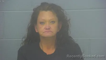 Mugshot of JENNIFER LYNN COMSTOCK booked in Greene County, Missouri on April 24, 2026