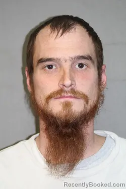 Mugshot of TRAVIS J VASEY