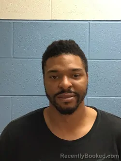 Mugshot of DREQWON MONZELL MOORE booked in Henry County, Missouri on April 22, 2026