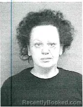 Mugshot of KELLY MICHELLE SPORTSMAN booked in Henry County, Missouri on June 4, 2026