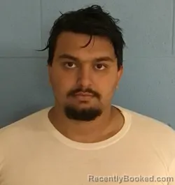 Mugshot of ADAM MOHAMED SAEED booked in Henry County, Missouri on June 10, 2026