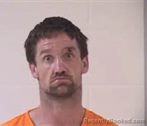 Mugshot of JONATHAN AARON RENFRO booked in Yancey County, North Carolina on July 2, 2026