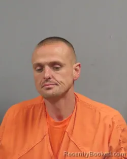 Mugshot of JUSTIN GOSSER