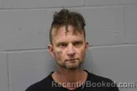 Mugshot of JUSTIN EMMANUEL DIEBOLT booked in Johnson County, Missouri on March 9, 2026