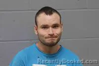 Mugshot of CAMERON MICHAEL BIDDINGER booked in Johnson County, Missouri on March 11, 2026