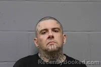 Mugshot of JONATHAN MATTHEW DINGLE booked in Johnson County, Missouri on March 18, 2026