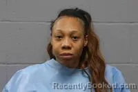 Mugshot of RA NIKKA MARIE TOPPS-MCINTOSH booked in Johnson County, Missouri on March 21, 2026