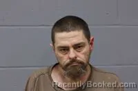 Mugshot of GEORGE TRAVIS ALLRED booked in Johnson County, Missouri on March 21, 2026