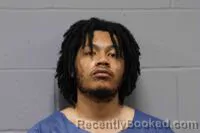 Mugshot of MENNIAHA TAVION TOFA booked in Johnson County, Missouri on March 22, 2026