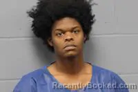 Mugshot of Q'WOMEAIRE Q'WAYYON MADDIX-BURTON booked in Johnson County, Missouri on March 24, 2026