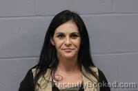 Mugshot of LAURA SUSANNE PASQUALE booked in Johnson County, Missouri on March 27, 2026