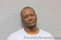 Mugshot of KWAME ALI BANKS booked in Johnson County, Missouri on March 28, 2026
