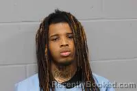 Mugshot of JOHNATHAN JAYVON-QUEZ DOSS booked in Johnson County, Missouri on April 3, 2026