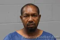 Mugshot of TRAVIS DEMOND HAMPTON booked in Johnson County, Missouri on April 5, 2026