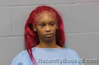 Mugshot of SUMAAYAH CHARAE RAYNOR-WILLIAMS booked in Johnson County, Missouri on April 25, 2026