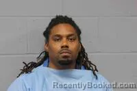 Mugshot of JYLE JAZZLON SCOTT booked in Johnson County, Missouri on May 12, 2026