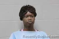 Mugshot of NYAMAR THOK CHUOL booked in Johnson County, Missouri on May 13, 2026