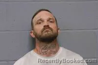 Mugshot of MERLE EDGAR COKE III booked in Johnson County, Missouri on May 21, 2026