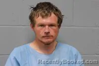 Mugshot of DEVIN JOSHUA EZELL booked in Johnson County, Missouri on May 25, 2026