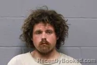 Mugshot of BRANDON RAIE CHISAM booked in Johnson County, Missouri on May 27, 2026