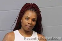 Mugshot of TAEJANAY LARUE ESTES booked in Johnson County, Missouri on June 15, 2026