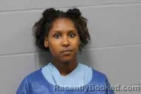 Mugshot of AURORA NIEVE MOORE booked in Johnson County, Missouri on June 23, 2026