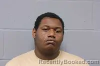 Mugshot of KHYSUM RHODES booked in Johnson County, Missouri on June 26, 2026