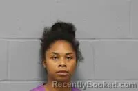 Mugshot of RANIA DIONNE THURMAN booked in Johnson County, Missouri on June 26, 2026
