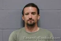 Mugshot of GAVIN WALLACE KUECK booked in Johnson County, Missouri on July 1, 2026