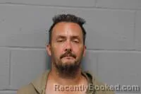 Mugshot of CHRISTOPHER MARK NEUMANN booked in Johnson County, Missouri on July 5, 2026