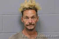 Mugshot of James Nicholis Hopkins booked in Johnson County, Missouri on August 30, 2026