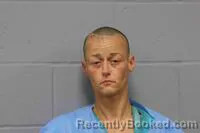 Mugshot of Alyssa Paige Njuguna booked in Johnson County, Missouri on August 31, 2026