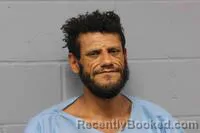 Mugshot of Aaron Micah Brown booked in Johnson County, Missouri on September 9, 2026
