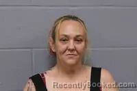 Mugshot of Maggie Lea Burchett booked in Johnson County, Missouri on October 8, 2026