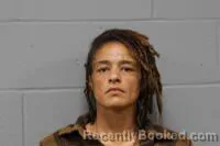 Mugshot of Amber Daun Benson booked in Johnson County, Missouri on October 8, 2026