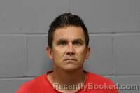 Mugshot of Justin Cash Ballard booked in Johnson County, Missouri on October 9, 2026
