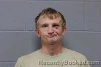 Mugshot of Christopher Allen Henton booked in Johnson County, Missouri on October 11, 2026