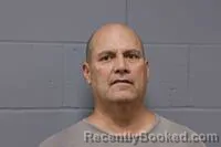 Mugshot of Andrew Lee Russell booked in Johnson County, Missouri on October 14, 2026