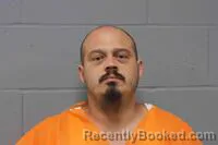 Mugshot of Matthew Joseph Delgado booked in Johnson County, Missouri on October 18, 2026